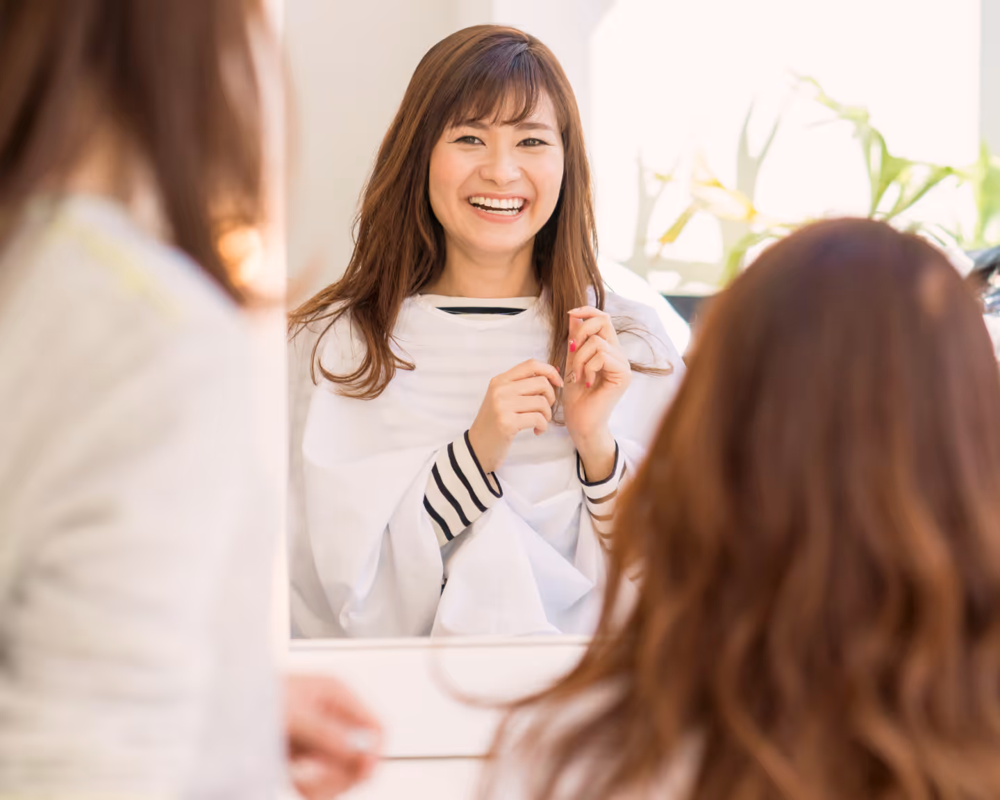 COCOを利用するママさんの笑顔のイメージ